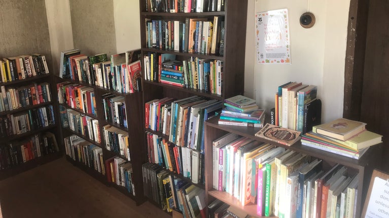 bookshelves stocked with second hand books